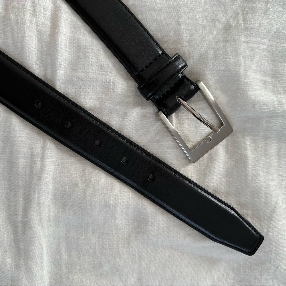 CKE men’s black leather belt with silver hardware
